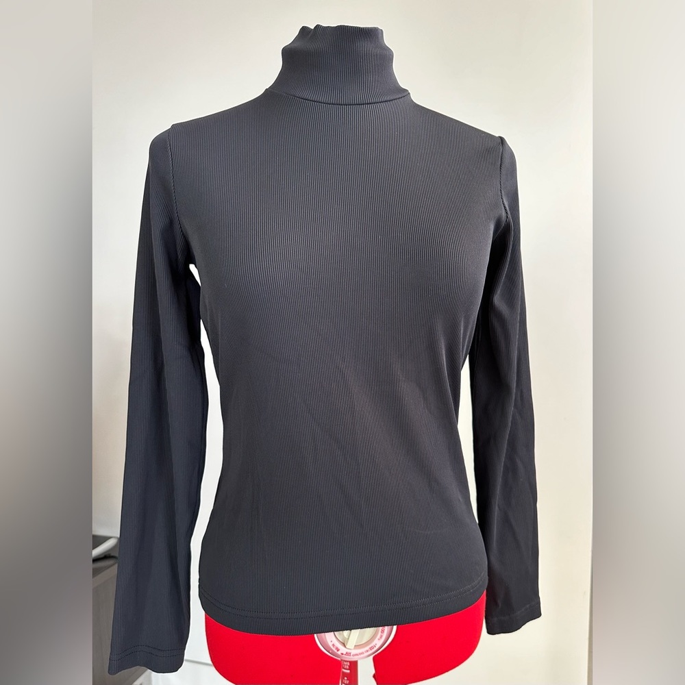 DKNY Long Sleeve Black turtleneck w/back zipper, Size M, textured fabric, Nice!